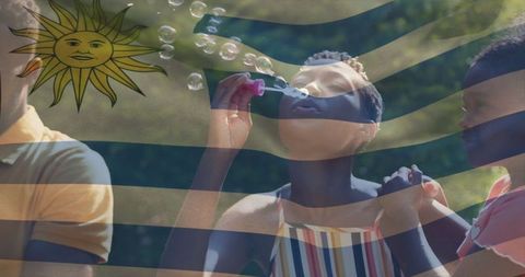 Playful Bubble Blowing with Uruguay Flag Outdoor Leisure