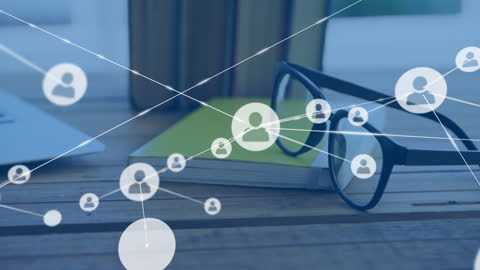 Digital Network Concept Over Glasses on Desk with Books