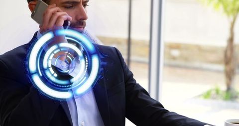 Tech-savvy Businessman Engaging with Virtual Interface in Office Setting