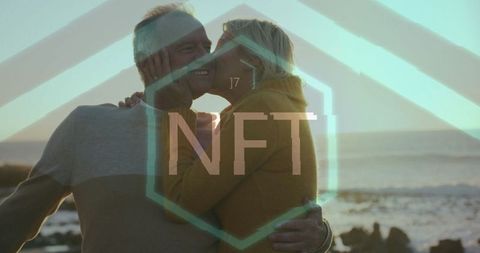 Senior couple embracing on coastal sunset with nft theme