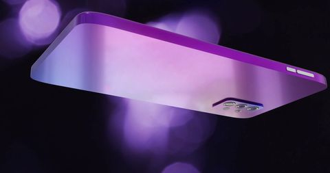 Sleek Smartphone Over Vibrant Bokeh Lights