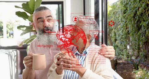 Senior couple enjoying morning coffee with red virus alert overlay, home health concern concept