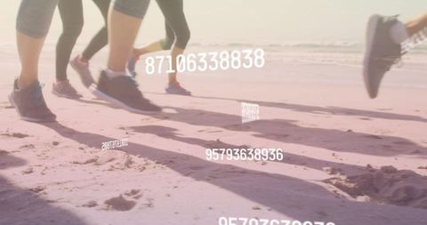 Women Running on Sandy Beach with Falling Digital Numbers