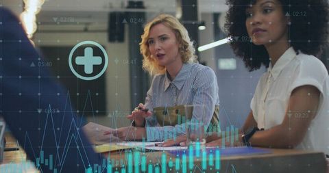 Businesswomen Collaborating with Technology Interface Overlay