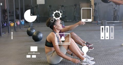 Diverse Athletes Exercising with Digital Interface Overlay at Gym