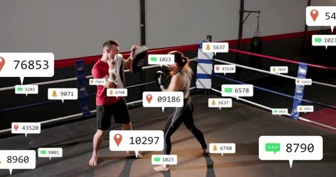 Female boxer throwing punch at male trainer holding pads in ring with social overlays
