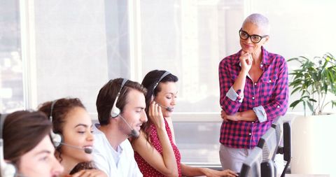 Modern Call Center Team Collaboration in Corporate Office