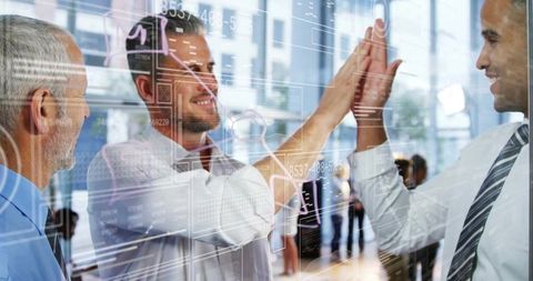 Businessmen Celebrating Success with Data and Technology Concept