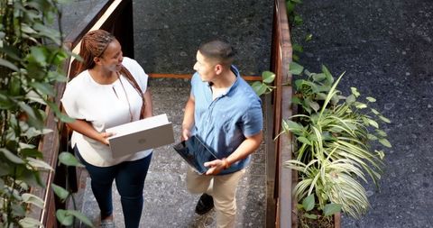 Multiracial Colleagues Celebrating Success in Office