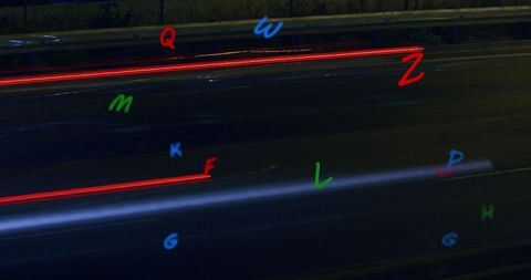 Falling Alphabet Letters Over Night City Street