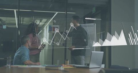 Reviewing Projected Analytics on Transparent Dashboard, Team Collaborating in Modern Office