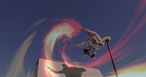 Skateboarder Jumping with Colorful Trail in Dynamic Urban Environment