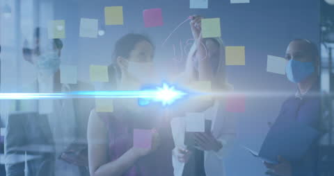 Team Brainstorming Session with Overlaid Digital Effects