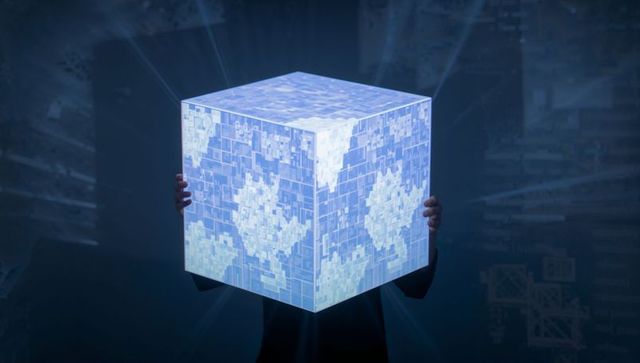 Person Holding Glowing Holographic Cube with Pixelated World Map Technology Concept for AI