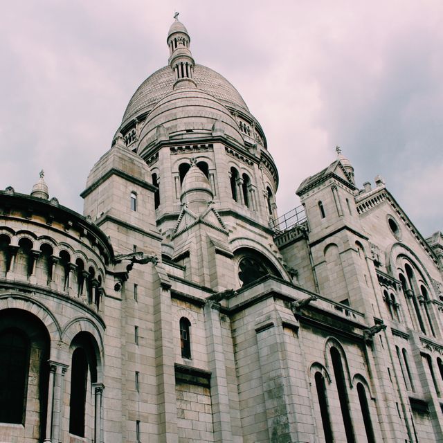 Impressive view of a classic historic cathedral with intricate stonework and grand design. Perfect for travel articles, tourism brochures, history presentations, and educational materials about architecture or religious structures.