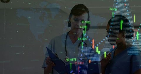 Healthcare Professionals Analyzing Digital Data in Medical Office