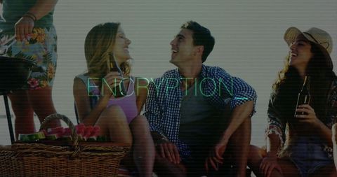 Friends Enjoying Beach Picnic and Grilling