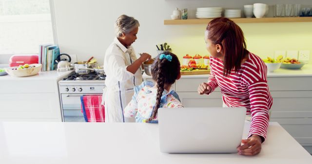 Three Generations of Women Cooking Together in Modern Kitchen - Download Free Stock Images Pikwizard.com