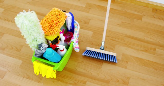 Cleaning Supplies and Broom on Wooden Floor - Download Free Stock Images Pikwizard.com