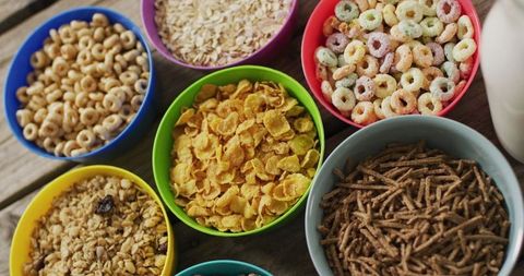 Colorful Bowls of Assorted Cereals on Wooden Table - Download Free Stock Images Pikwizard.com