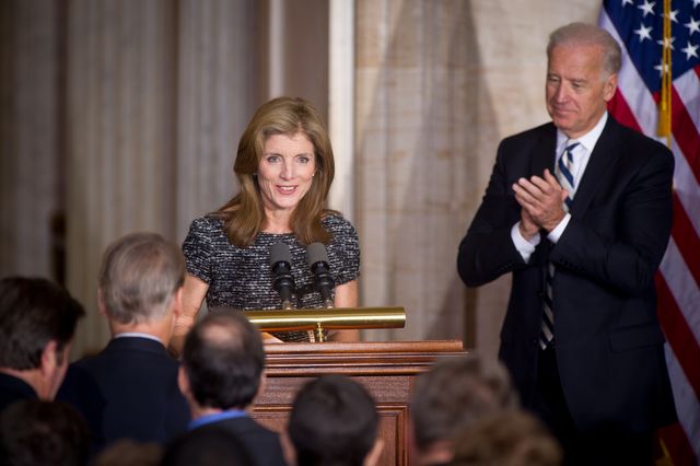 Caroline Kennedy is welcomed the podium by U.S. Vice President Joe Biden and other dignitaries before speaking at an event recognizing the 50th anniversary of the inauguration of John F. Kennedy as President of the United States, Thursday, Jan. 20, 2011 in the rotunda at the U.S. Capitol.  Photo Credit: (NASA/Bill Ingalls)