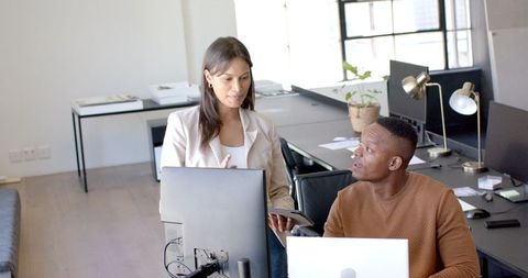 Professionals Collaborate in Modern Office for Successful Project