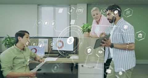 Team Analyzing Financial Charts with Augmented Data Interface in Modern Office