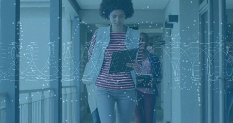 Dynamic Business Team Navigating Digital Schematics