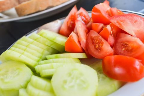 Sliced Cucumber and Tomato Platter Showing Fresh Summer Salad Ingredients and Texture