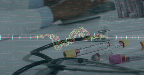 Monkeypox test tube with digital analytics overlay, stethoscope and vials on lab bench