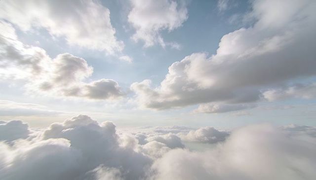 Sunlit Cumulus Cloudscape Revealing Vast Depth, Soft Texture, Horizon Haze and Atmospheric Light