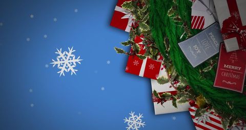 Festive Christmas Gifts and Snowflakes Background