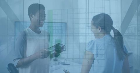 Business Colleagues Discussing Over Digital Interface