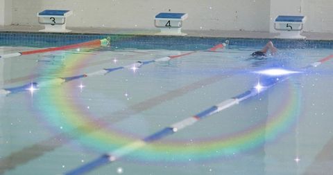 Athlete Performing Freestyle Stroke in Pool with Sparkling Effect