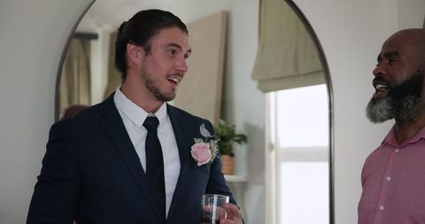 Joyful Celebration of Friendship at Wedding Reception