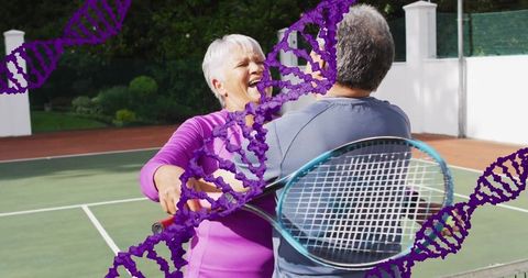 Senior couple embracing during tennis match with dna overlay