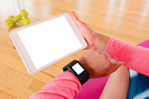 fitness enthusiast with transparent tablet screen and smartwatch - Download Free Stock Videos Pikwizard.com