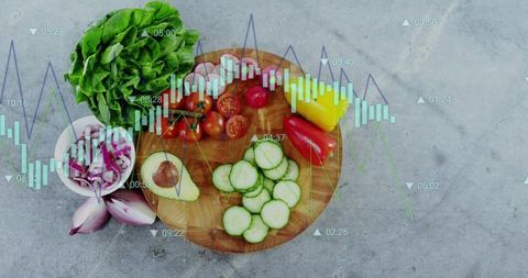 Fresh vegetables on cutting board with chart overlays