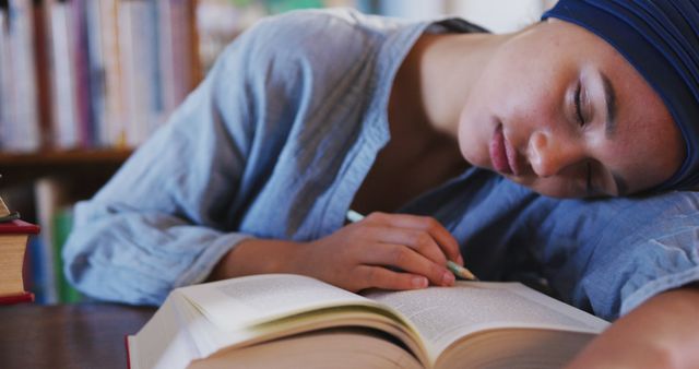 Young Woman Sleeping While Studying in Library, Overworking Concept - Download Free Stock Images Pikwizard.com