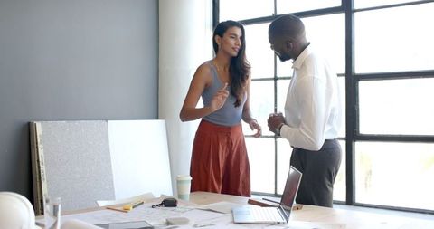 Diverse colleagues engaging in intense business discussion