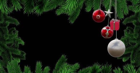 Christmas baubles and fir branches festive background