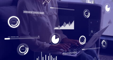 Businesswoman Analyzing Financial Data on Laptop with Digital Interfaces