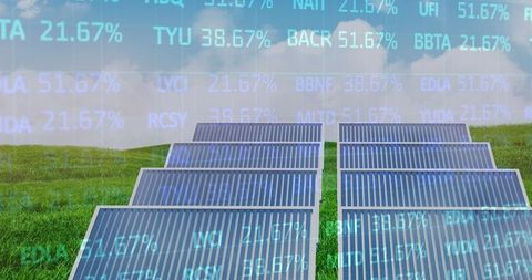 Solar panels in green field with digital data overlay
