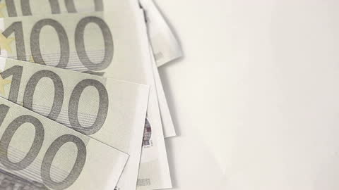 Euros Displayed on Table Highlighting Financial Wealth