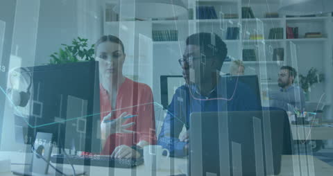 Multiethnic Business Team Analyzing Data in Modern Office