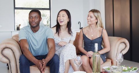 Friends gather for casual house party celebration