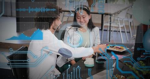 Young professionals sharing pastries and analyzing data with futuristic ar interface