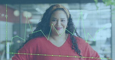 confident businesswoman analyzing financial graphs - Download Free Stock Images Pikwizard.com