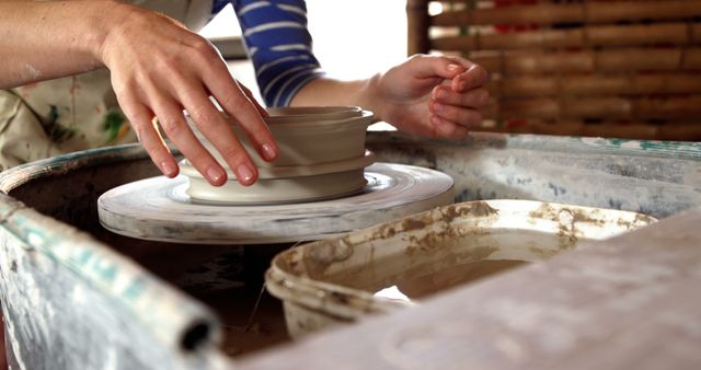 Hands Sculpting Clay on Pottery Wheel - Download Free Stock Images Pikwizard.com