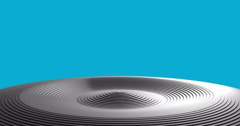 Dynamic grey circles pattern on vibrant blue background